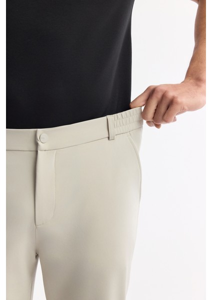 Erkek Slim Fit Taş Beli Lastikli Bi-Stretch Teknik Kumaş Pantolon A51Y3077 indirimleri