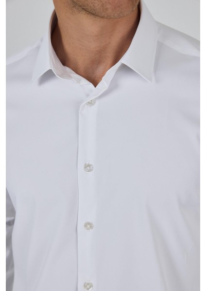 Beyaz Sert Yaka Cepsiz Gabardin Uzun Kol Slim Fit Esnek Gömlek 1004250234 fırsatları