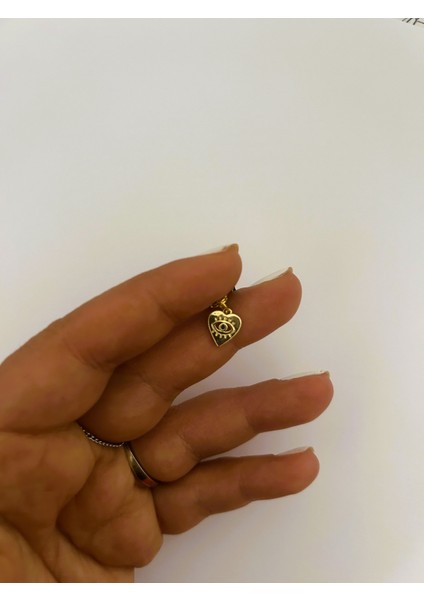 Badelis Çelik Gold Kalp Gözü Detaylı Charm fırsatları