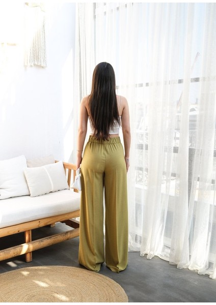Keten Önü Çapraz Parçali Lasti̇kli̇ ve Bağcikli Geni̇ş Paça Pantolon