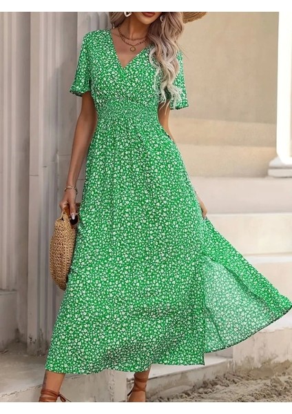 Kadın Kısa Kollu Kruvaze Yaka Beli Lastikli Yanlardan Yırtmaçlı Uzun Çiçekli Elbise