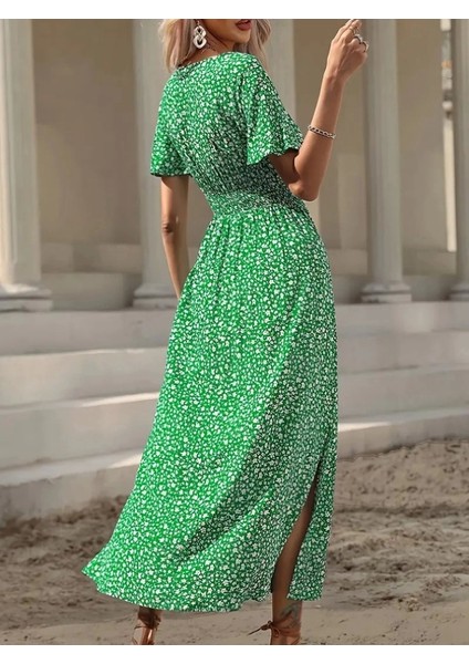 Kadın Kısa Kollu Kruvaze Yaka Beli Lastikli Yanlardan Yırtmaçlı Uzun Çiçekli Elbise modelleri