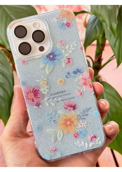 Apple iPhone 16 Pro Uyumlu Kılıf Mavi Simli Çiçek Desenli Renkli Parlak Darbe Emici Kapak
