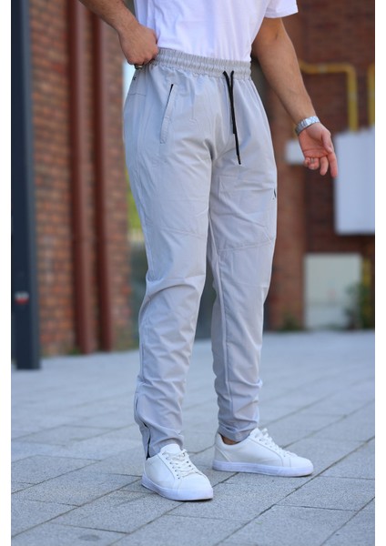 Erkek Açık Gri Eşofman Altı Fermuarlı Paça Kaliteli Paraşüt Kumaş fiyatları