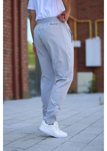 Erkek Açık Gri Eşofman Altı Fermuarlı Paça Kaliteli Paraşüt Kumaş modelleri