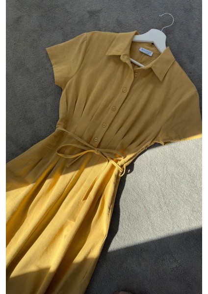 Magarde Kadın Beli Pileli Üstü Düğmeli Kısa Kollu Keten Görünümlü Uzun Elbise fırsatları