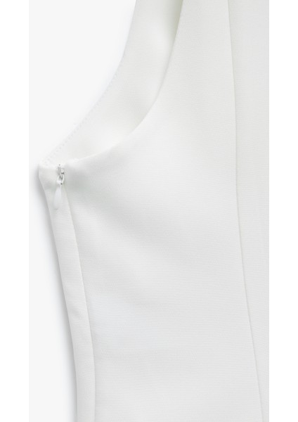 Volümlü Kolsuz Kare Yaka Bluz indirimleri