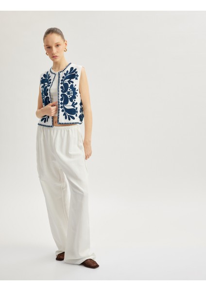 Aplike Nakışlı Bisiklet Yaka Kolsuz Crop Yelek fiyatları