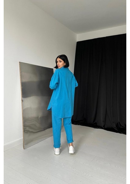 Mavi Gömlek ve Çıtçıtlı Pantolon Takım