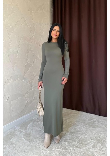 Haki Vücudu Saran Uzun Elbise