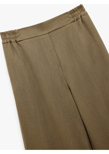 Lastikli Standart Bel Astarlı Viskon Cepli Geniş Paça Pantolon