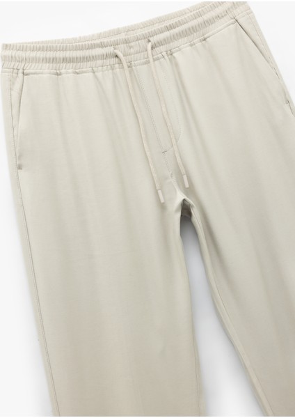 Viskon Cep Detaylı Rayon Tapered Beli Bağcıklı Eşofman Pantolon