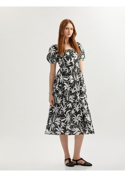 Pamuklu Kısa Balon Kollu Arkası Dekolte Detaylı Midi Boy Çiçekli Elbise fiyatları