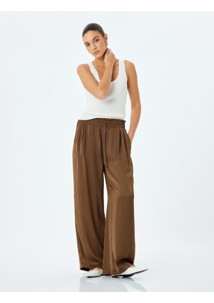 Bel Bağlamalı Lastikli Cepli Saten Palazzo Pantolon