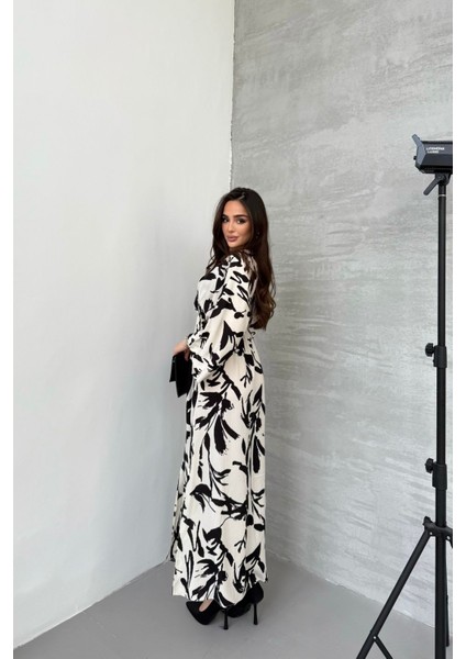 Kadın Siyah Beyaz Kuş Desenli Beli Lastikli Uzun Yırtmaçlı Kruvaze Elbise modelleri