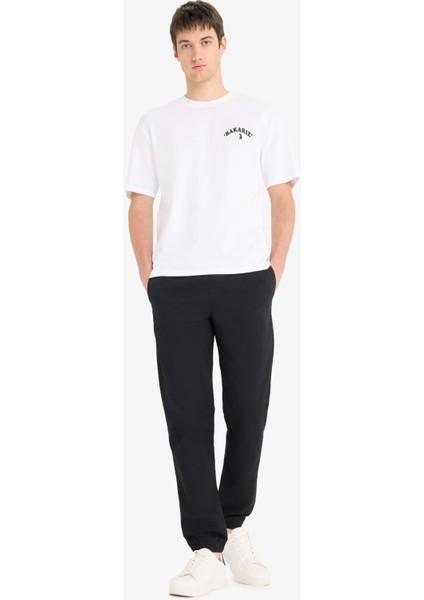 %100 Pamuk Boxy Fit Bisiklet Yaka Sırt Baskılı Kısa Kollu Tişört F4752AX25HS fiyatları