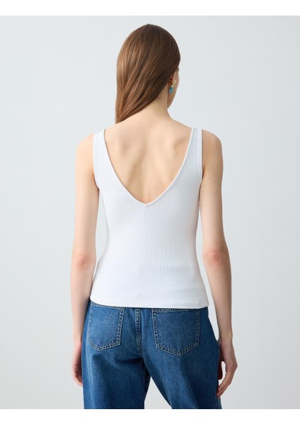 Beyaz Dar Kesim V Yaka Örme Atlet indirimleri