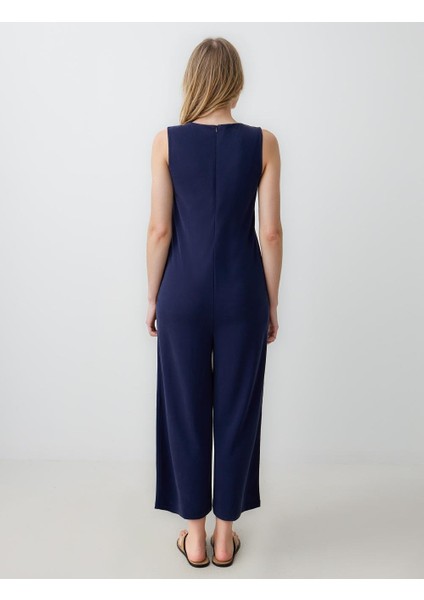 Lacivert Düz Kesim V Yaka Örme Tulum fırsatları