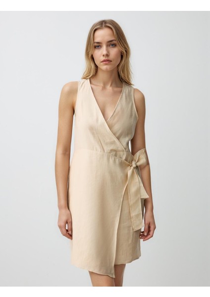 Ekru V Yaka Kolsuz Fiyonk Detaylı Dokuma Mini Elbise