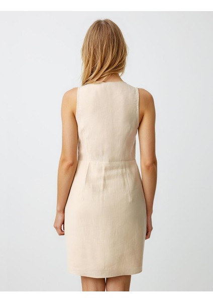 Ekru V Yaka Kolsuz Fiyonk Detaylı Dokuma Mini Elbise indirimleri