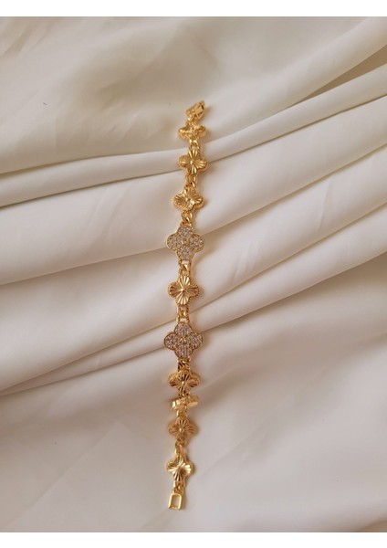 Pirinç Gold Renk Zirkon Taşlı Yonca Model Kadın Bileklik