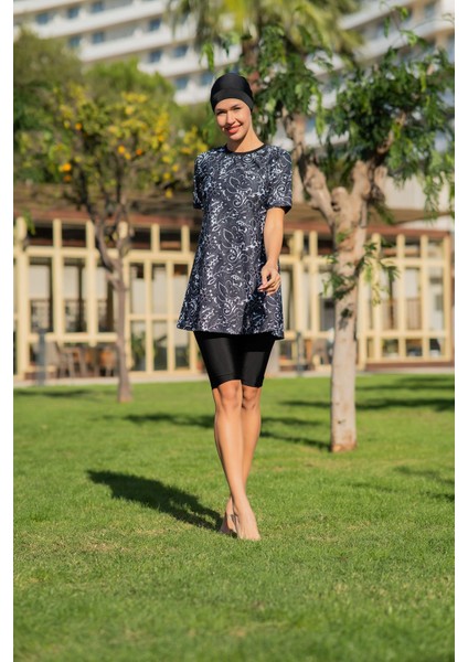 Siyah Beyaz Desenli Yarım Kol Büyük Beden Micro (Esnek ve Çabuk Kuruyan) Kumaş Yarı Tesettür Mayo modelleri