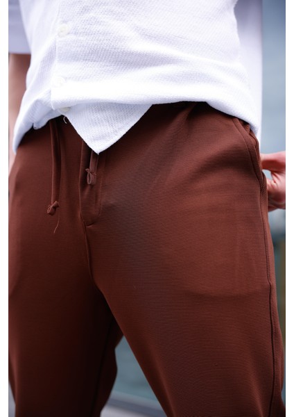 Erkek Kahve Renk Likralı Kumaş Jogger Pantolon