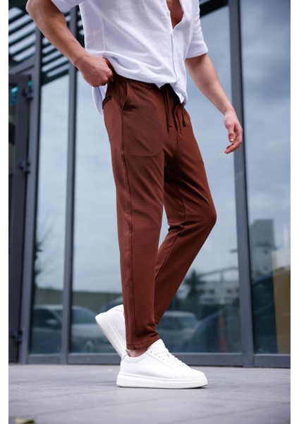 Erkek Kahve Renk Likralı Kumaş Jogger Pantolon modelleri