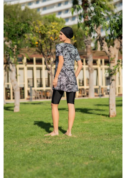 Siyah Yaprak Desenli Yarım Kol Micro (Esnek ve Çabuk Kuruyan) Kumaş Yarı Tesettür Mayo fiyatları