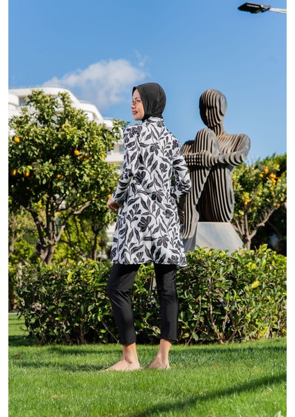 Siyah Beyaz Yaprak Desenli Balıkçı Yaka Micro (Esnek ve Çabuk Kuruyan) Kumaş Tesettür Mayo fiyatları