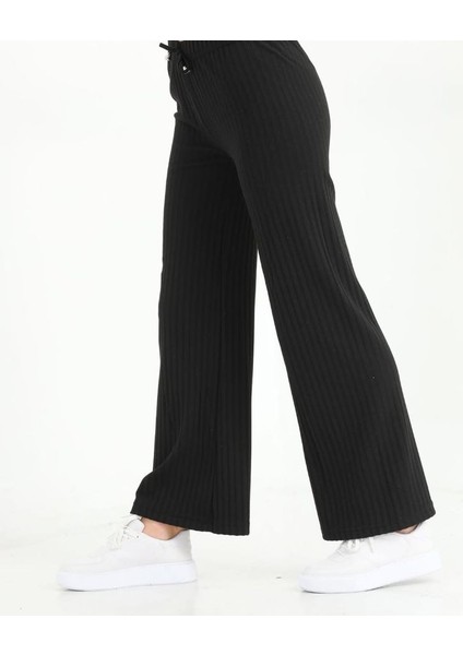 Kadın Bol Paça Ribanalı Beli Lastikli Dekoratif Bağcık Detaylı Pantolon fırsatları
