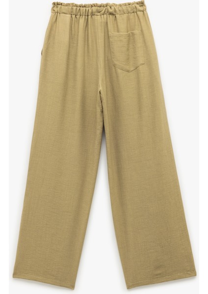 Beli Bağcıklı Cepli Keten Karışımlı Bol Paça Pantolon fiyatları