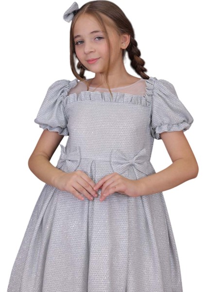 Kız Çocuk Yakası Tüllü Boydan Pulpayet Işlemeli Omuzu Fiyonk Detaylı Gold Elbise modelleri