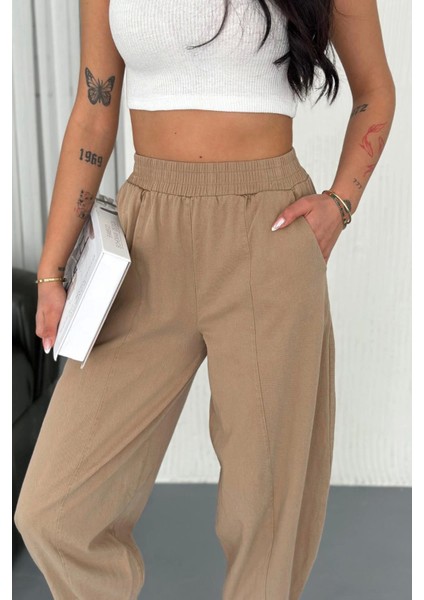Kadın Pamuklu Bel Lastikli Dikiş Detaylı Camel Gabardin Kumaş Pantolon indirimleri