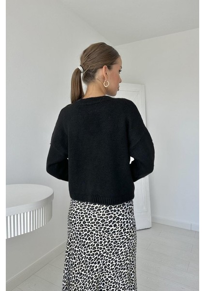 Siyah Faça ve Zincirli Triko Kazak fırsatları