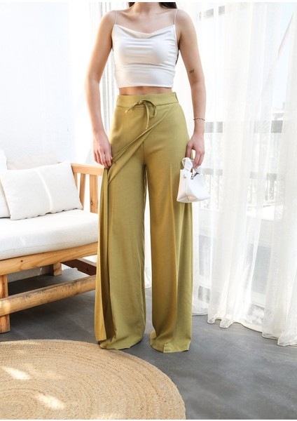 Munn Collection Keten Önü Çapraz Parçali Lasti̇kli̇ ve Bağcikli Geni̇ş Paça Pantolon modelleri