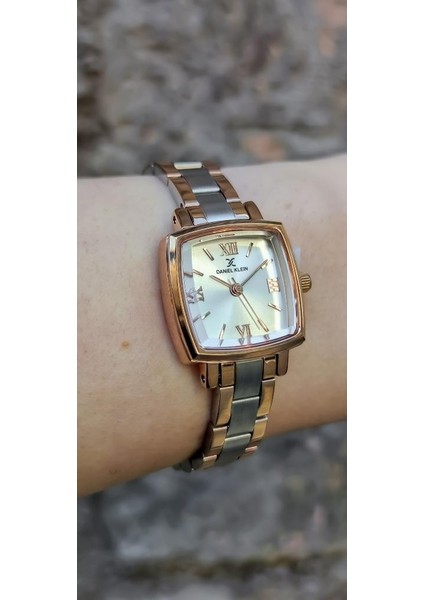 DKE.1.10839-6 Kare Kadran Metal Kordon Metal Kasa 3 Atm Suya Dayanıklı Metalik-Rose Renk Kadın Kol Saati