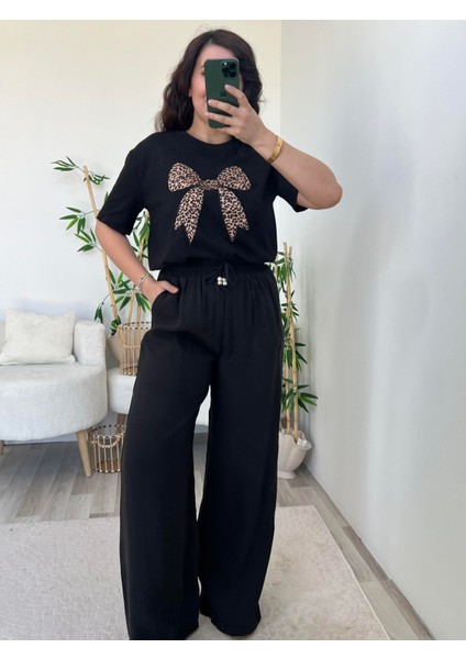 Siyah Beli Lastikli Boncuk Detaylı Bol Pantolon modelleri