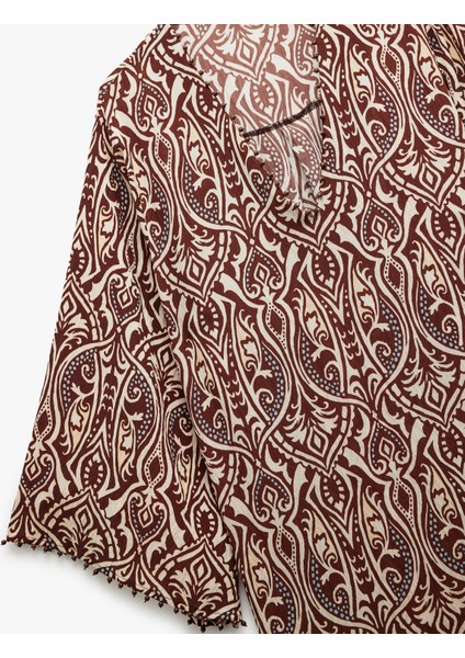 x Melis Ağazat - Yırtmaç Detaylı Etnik Desenli Uzun Geniş Kollu V Yaka Kimono Elbise indirimleri