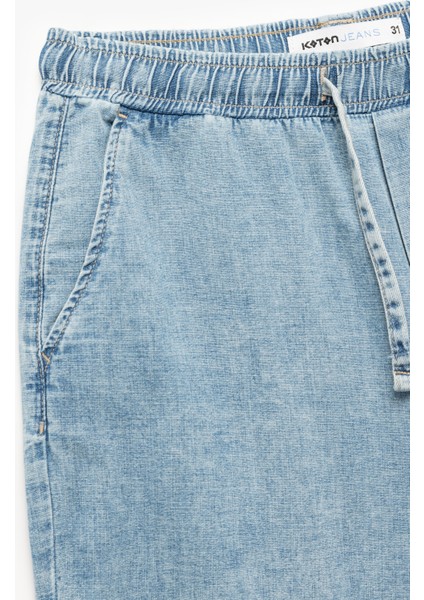 Pamuklu Bol Cep Detaylı Oversize Beli Bağcıklı Bermuda Jean Şort