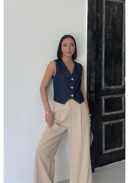 Düğmeli ve Kısa Boylu Dar Kalıplı Cepsiz Kolsuz Kadın Kot Yelek Slaplı Lacivert Denim fiyatları