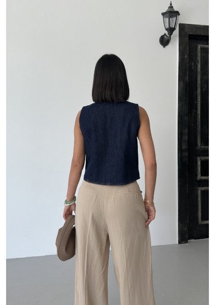 Düğmeli ve Kısa Boylu Dar Kalıplı Cepsiz Kolsuz Kadın Kot Yelek Slaplı Lacivert Denim modelleri