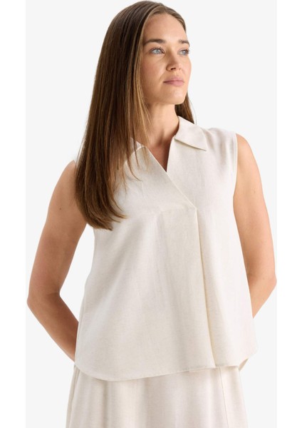 Regular Fit Polo Yaka Keten Karışımlı Kolsuz Bluz F0982AX25HS indirimleri