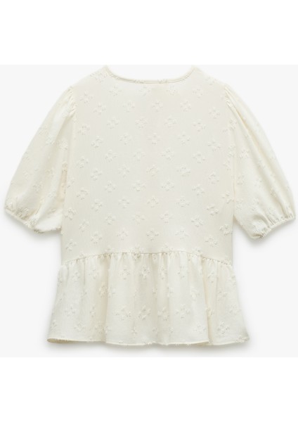 Dokulu Kısa Balon Kollu Fiyonklu Önden Bağcıklı Bluz fırsatları