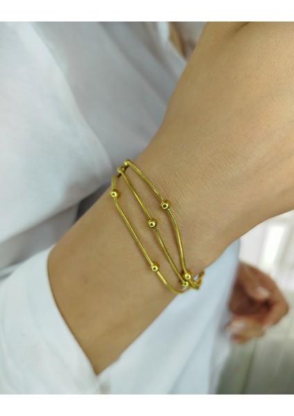 Gold Renkli Üçlü Bağımsız Zincir ve Yuvarlak Detayları Olan Paslanmaz Çelik Kadın Bileklik