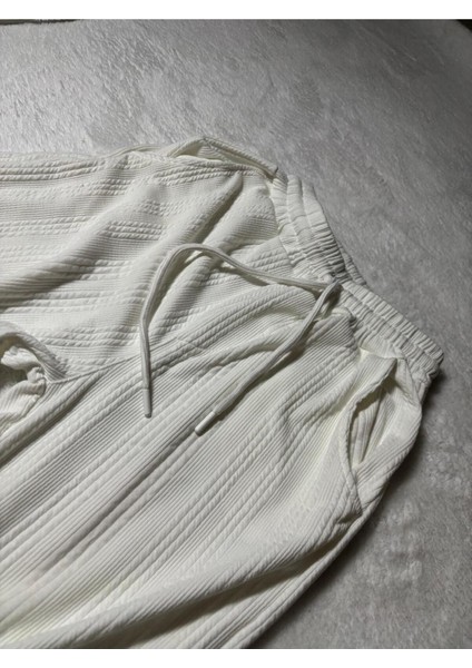 Baggy Beyaz Renk Ottoman Çizgi Detaylı Pantolon fiyatları