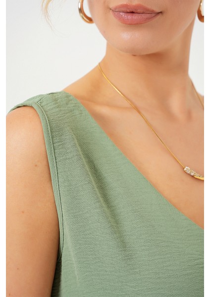 V Yaka Sıfır Kol Bluz 950 - Çağla indirimleri