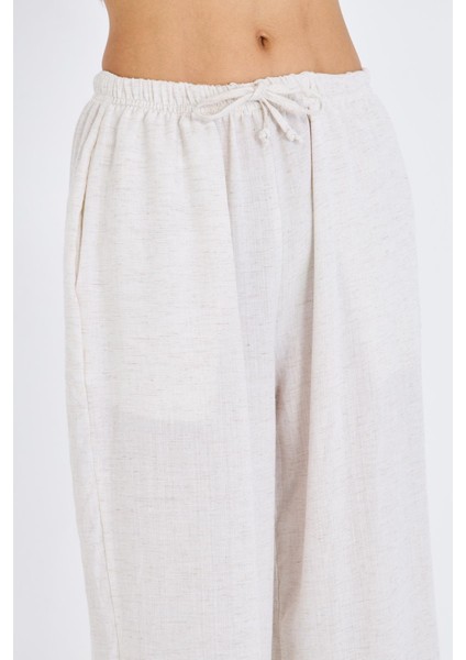 Bol Paça Keten Görünümlü Pantolon indirimleri