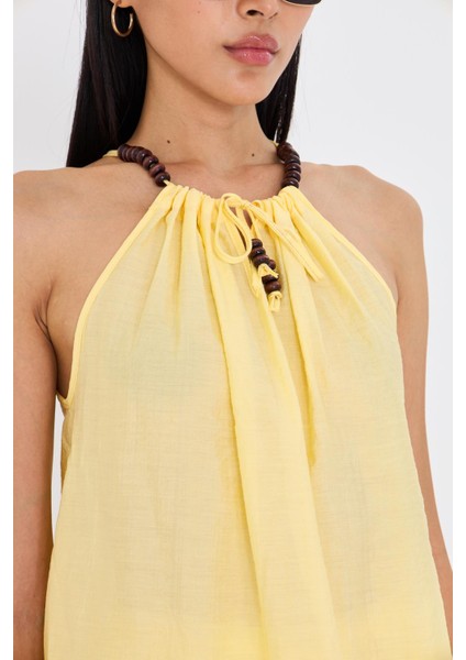 Sıfır Kollu Boncuk Detaylı Halter Yaka Bluz modelleri