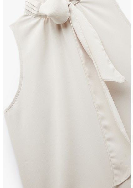 Bağlamalı Dik Yaka Kolsuz Bluz modelleri